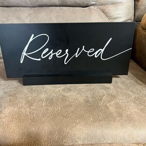 Black Reserved Sign